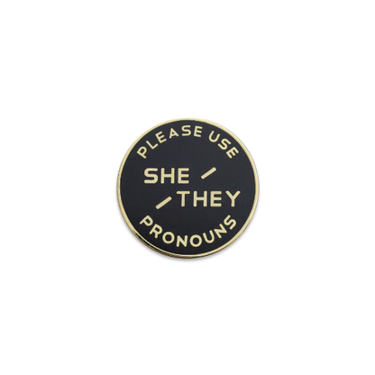 Black & Gold Circular Enamel Pronoun Pin: She/They: Rubber Back